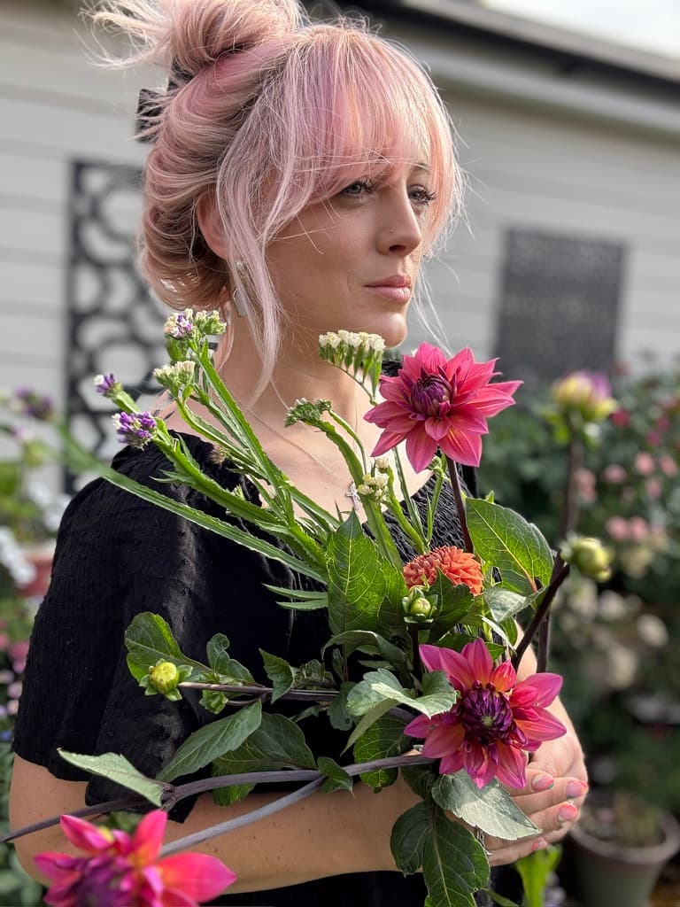 Cara holding cut dahlias